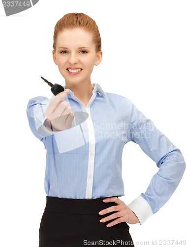 Image of happy woman with car key
