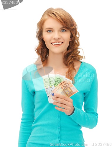 Image of happy teenage girl with euro cash money