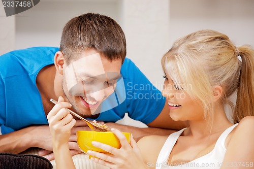 Image of happy couple at home