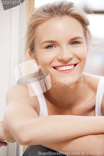 Image of happy and smiling teenage girl