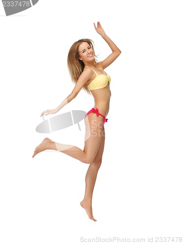 Image of picture of jumping woman in bikini