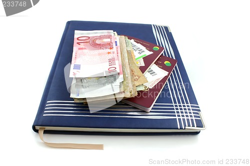 Image of Diary with passport and Money