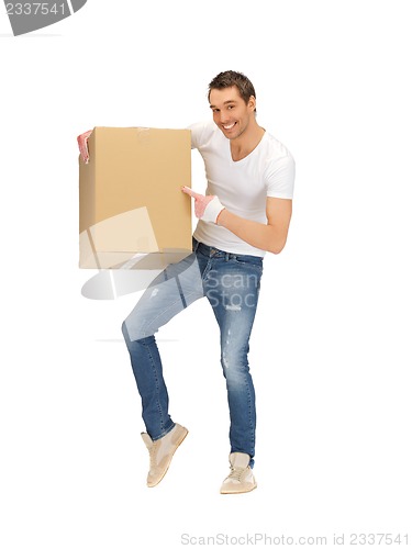 Image of handsome man with big box