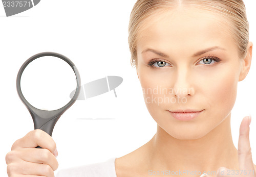 Image of woman with magnifying glass