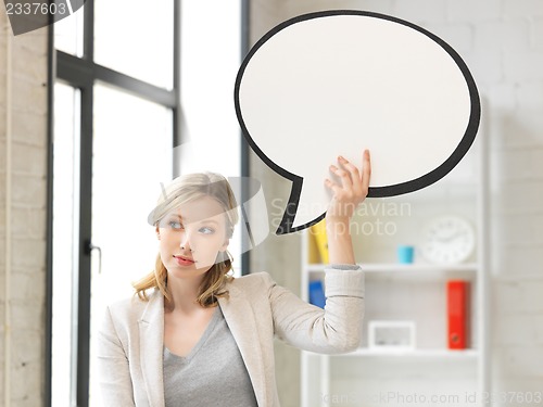 Image of thinking businesswoman with blank text bubble