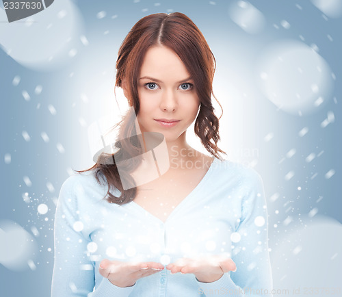 Image of snow on the palm of her hand