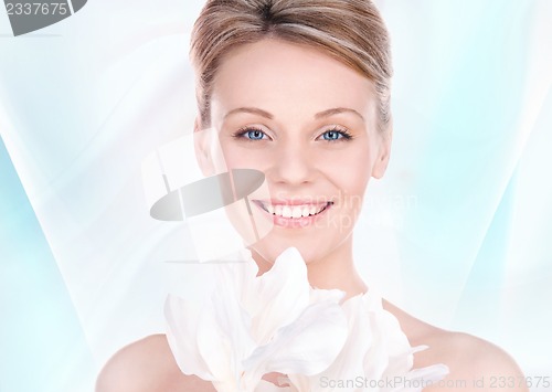 Image of beautiful woman with madonna lily