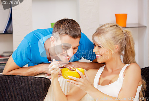 Image of happy couple at home