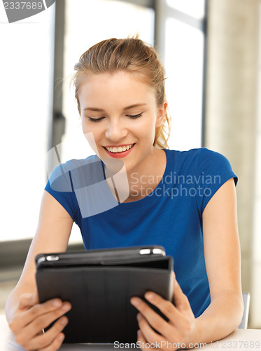 Image of happy teenage girl with tablet pc computer
