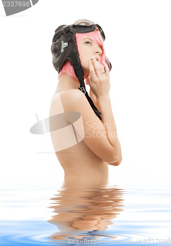 Image of topless pink hair girl in aviator helmet