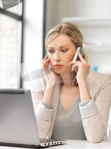 Image of businesswoman with cell phone