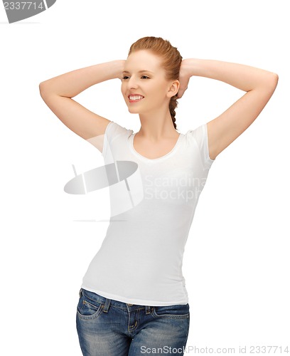 Image of smiling teenage girl in blank white t-shirt