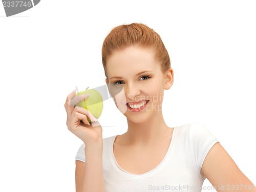 Image of teenage girl with green apple