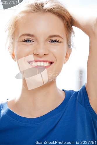 Image of happy and smiling teenage girl