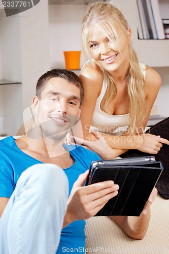 Image of happy couple at home