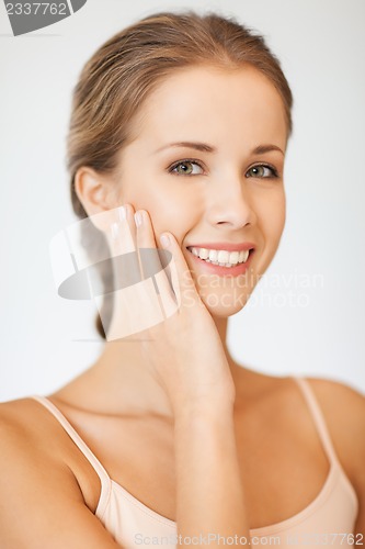 Image of face and hands of beautiful woman