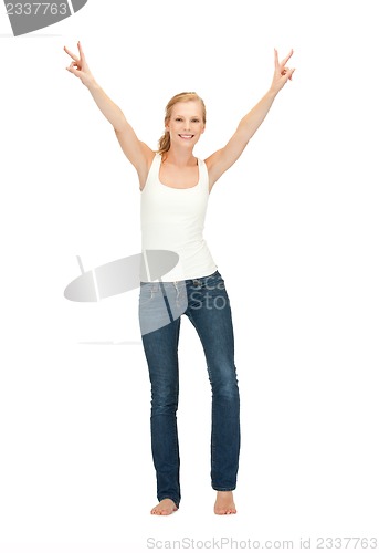 Image of girl in blank white t-shirt showing victory sign