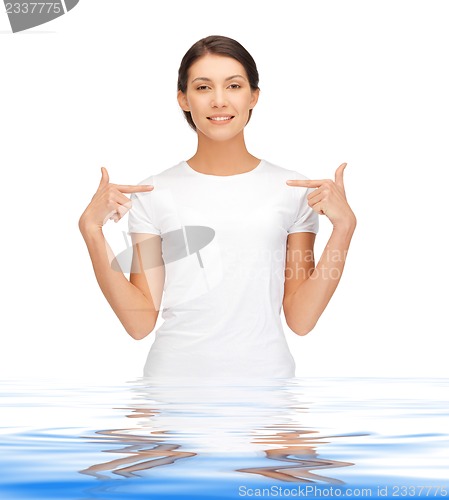 Image of happy and carefree teenage girl in water