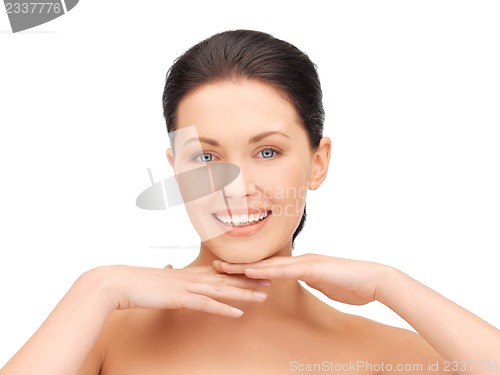Image of face and hands of beautiful woman