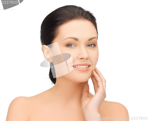 Image of face and hands of beautiful woman