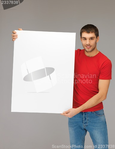 Image of handsome man with big blank board