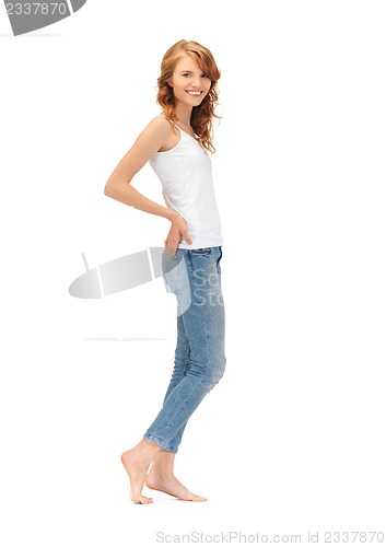 Image of smiling teenage girl in blank white t-shirt