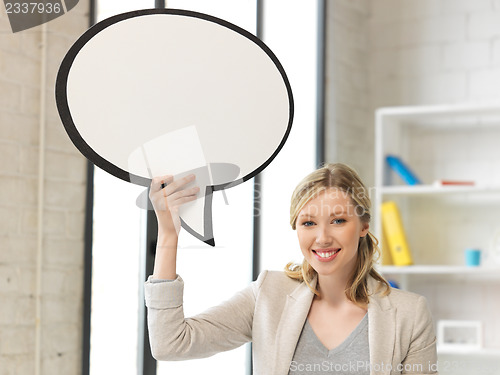 Image of smiling businesswoman with blank text bubble