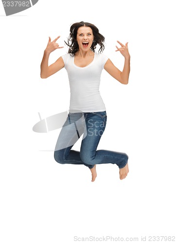 Image of jumping woman in blank white t-shirt