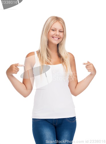 Image of smiling teenage girl in blank white t-shirt