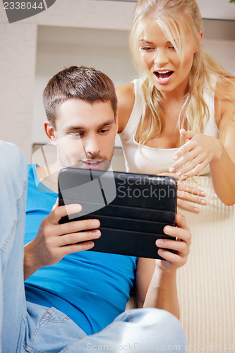 Image of happy couple at home