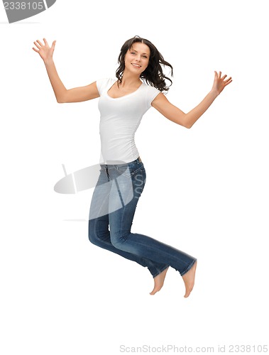Image of jumping woman in blank white t-shirt
