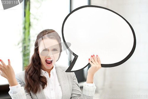 Image of screaming businesswoman with blank text bubble