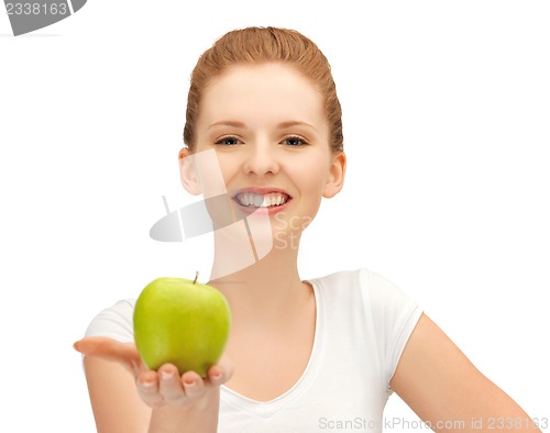 Image of teenage girl with green apple