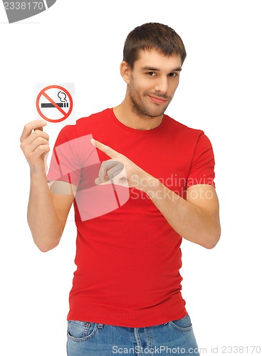 Image of man in red shirt with no smoking sign