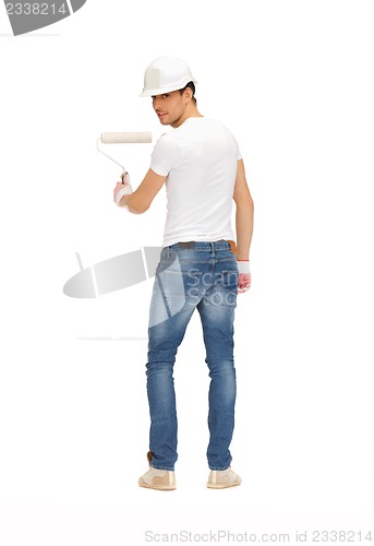 Image of handsome painter in helmet