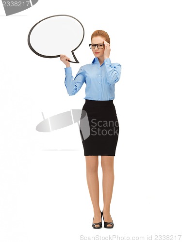 Image of pensive businesswoman with blank text bubble