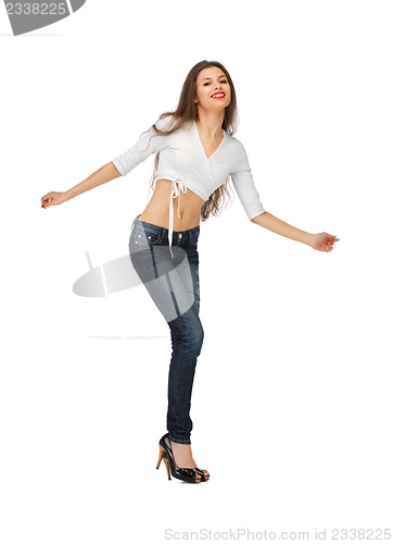 Image of dancing woman in casual clothes