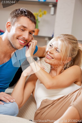 Image of happy couple at home