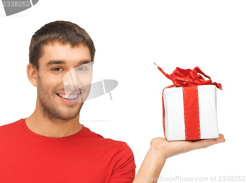 Image of handsome man with a gift