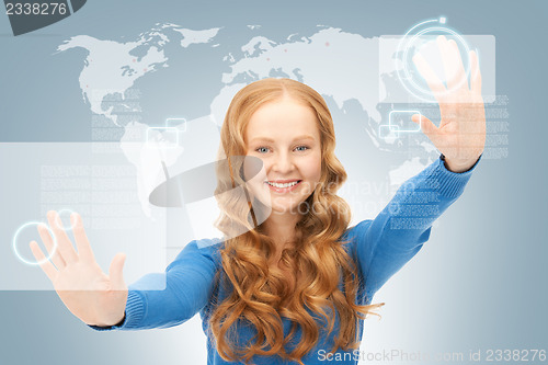 Image of businesswoman working with touch screen