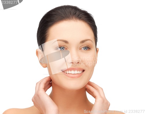 Image of face and hands of beautiful woman