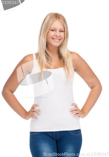 Image of smiling teenage girl in blank white t-shirt