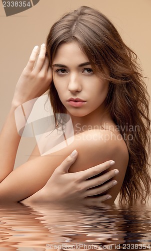 Image of beautiful woman in water