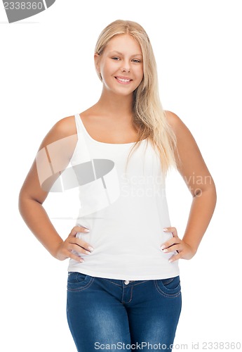 Image of smiling teenage girl in blank white t-shirt