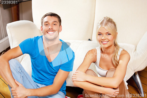 Image of happy couple at home