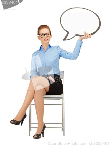Image of pensive businesswoman with blank text bubble