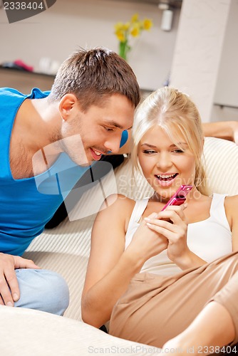 Image of happy couple at home