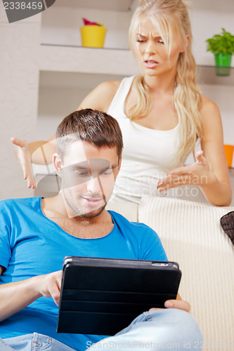 Image of couple with tablet PC