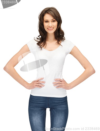 Image of smiling teenage girl in blank white t-shirt