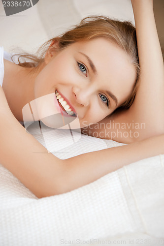 Image of happy and smiling teenage girl
